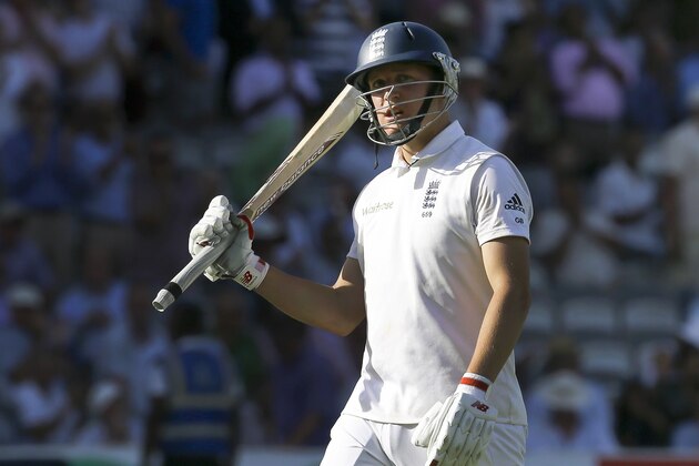 England's Gary Ballance leaves the field after being caught by MS Dhoni off the bowling of India's Bhuvneshwar Kumar during the second day of the second test match between England and India at Lord's cricket ground in London, Friday, July 18, 2014. (AP Photo/Kirsty Wigglesworth)