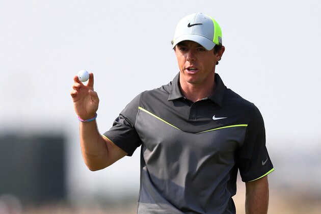 Rory McIlroy of Northern Ireland holds up his ball after playing a birdie on the 8th green during the second day of the British Open Golf championship at the Royal Liverpool golf club, Hoylake, England, Friday July 18, 2014. (AP Photo/Scott Heppell) Rory McIlroy of Northern Ireland holds up his ball after playing a birdie on the 8th green during the second day of the British Open Golf championship at the Royal Liverpool golf club, Hoylake, England, Friday July 18, 2014. (AP Photo/Scott Heppell)