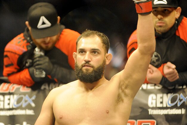 Johny Hendricks is announced to the crowd before a UFC 171 mixed martial arts welterweight title bout, Saturday, March 15, 2014, in Dallas. Hendricks won by decision. (AP Photo/Matt Strasen)