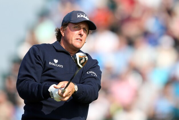 Phil Mickelson of the US watches his shot off the 3rd tee during the second day of the British Open Golf championship at the Royal Liverpool golf club, Hoylake, England, Friday July 18, 2014. (AP Photo/Scott Heppell)