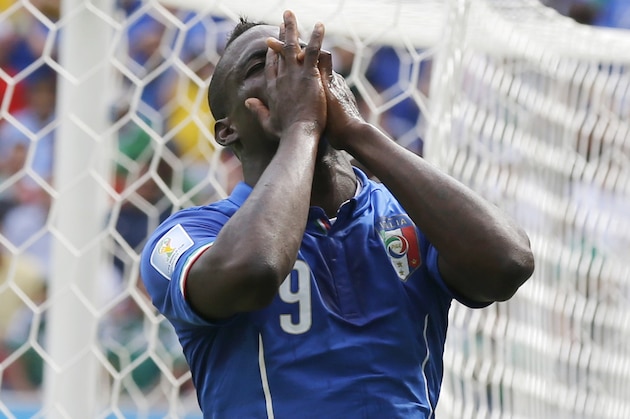 Italy's Mario Balotelli reacts after missing a chance during the group D World Cup soccer match between Italy and Costa Rica at the Arena Pernambuco in Recife, Brazil, Friday, June 20, 2014.  (AP Photo/Frank Augstein)