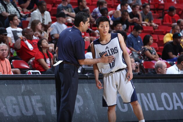 LAS VEGAS, NV - JULY 16: Yuki Togashi #18 of the Dallas Mavericks talks with Head Coach Kaleb Canales during the game against the Charlotte Hornets at the Samsung NBA Summer League 2014 on July 16, 2014 at the Thomas & Mack Center in Las Vegas, Nevada. NOTE TO USER: User expressly acknowledges and agrees that, by downloading and or using this photograph, User is consenting to the terms and conditions of the Getty Images License Agreement. Mandatory Copyright Notice: Copyright 2014 NBAE (Photo by Jack Arent/NBAE via Getty Images)