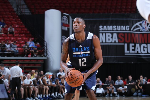 LAS VEGAS, NV - JULY 12: Eric Griffin #12 of the Dallas Mavericks shoots a free throw against the Minnesota Timberwolves during the game at the Samsung NBA Summer League 2014 on July 12, 2014 at the Thomas & Mack Center in Las Vegas, Nevada. NOTE TO USER: User expressly acknowledges and agrees that, by downloading and or using this photograph, User is consenting to the terms and conditions of the Getty Images License Agreement. Mandatory Copyright Notice: Copyright 2014 NBAE (Photo by Jack Arent/NBAE via Getty Images)