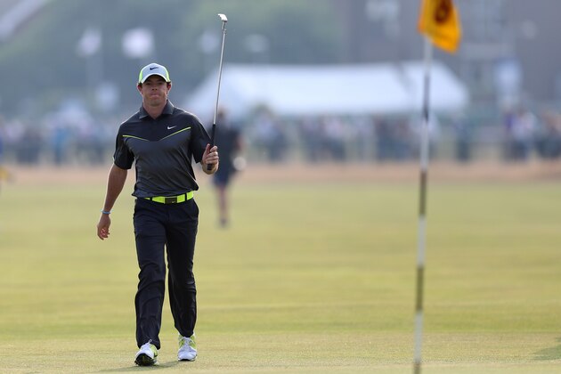 Rory McIlroy of Northern Ireland walks up to the 18th green during the second day of the British Open Golf championship at the Royal Liverpool golf club, Hoylake, England, Friday July 18, 2014. (AP Photo/Scott Heppell)
