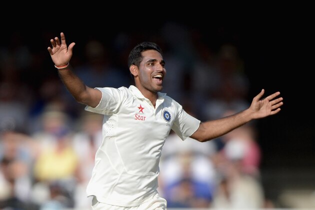 LONDON, ENGLAND - JULY 18:  Bhuvneshwar Kumar of India celebrates dismissing Gary Ballance of England during day two of 2nd Investec Test match between England and India at Lord's Cricket Ground on July 18, 2014 in London, United Kingdom.  (Photo by Gareth Copley/Getty Images)