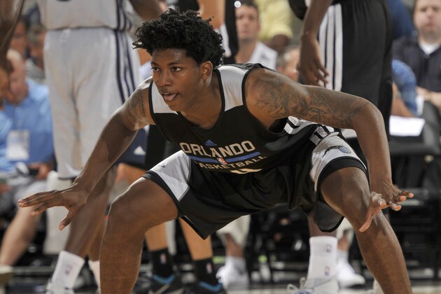 ORLANDO, FL - JULY 8: Elfrid Payton #4 of the Orlando Magic defends against the Memphis Grizzlies during the game during the Samsung NBA Summer League 2014 on July 8, 2014 at Amway Center in Orlando, Florida. NOTE TO USER: User expressly acknowledges and agrees that, by downloading and or using this photograph, User is consenting to the terms and conditions of the Getty Images License Agreement. Mandatory Copyright Notice: Copyright 2014 NBAE  (Photo by Fernando Medina/NBAE via Getty Images)