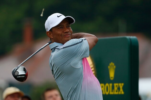 HOYLAKE, ENGLAND - JULY 19:  Tiger Woods of the United States tees off on the 10th hole during the third round of The 143rd Open Championship at Royal Liverpool on July 19, 2014 in Hoylake, England.  (Photo by Tom Pennington/Getty Images)