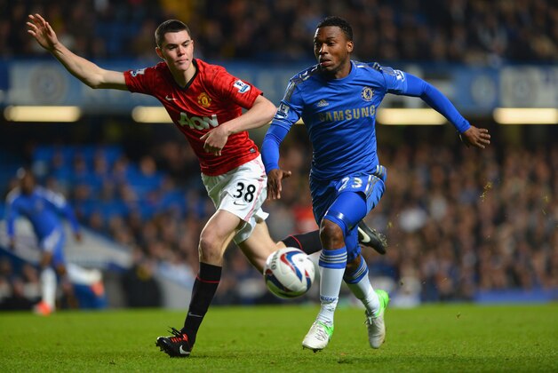 LONDON, ENGLAND - OCTOBER 31: Daniel Sturridge of Chelsea takes on Michael Keane of Manchester United during the Capital One Cup Fourth Round match between Chelsea and Manchester United at Stamford Bridge on October 31, 2012 in London, England.  (Photo by Shaun Botterill/Getty Images)