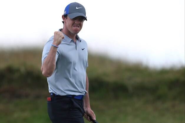 Rory McIlroy of Northern Ireland celebrates playing a birdie on the 14th hole during the third day of the British Open Golf championship at the Royal Liverpool golf club, Hoylake, England, Saturday July 19, 2014. (AP Photo/Jon Super)