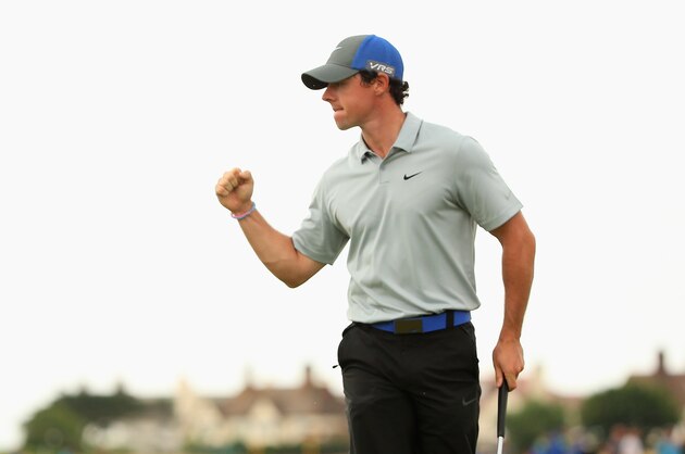 HOYLAKE, ENGLAND - JULY 19:  Rory McIlroy of Northern Ireland celebrates holing an eagle putt on the 16th green during the third round of The 143rd Open Championship at Royal Liverpool on July 19, 2014 in Hoylake, England.  (Photo by Mike Ehrmann/Getty Images)