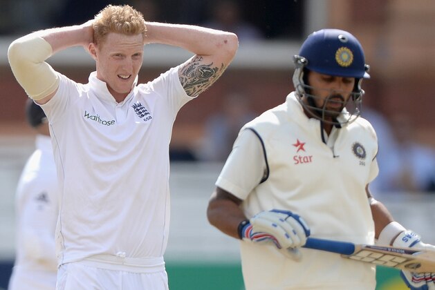 LONDON, ENGLAND - JULY 19:  Ben Stokes of England holds his head as Murali Vijay of India scores runs during day three of 2nd Investec Test match between England and India at Lord's Cricket Ground on July 19, 2014 in London, United Kingdom.  (Photo by Gareth Copley/Getty Images)