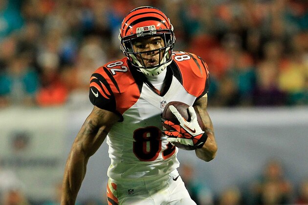 MIAMI GARDENS, FL - OCTOBER 31:  Marvin Jones #82 of the Cincinnati Bengals runs with ball against the Miami Dolphins at Sun Life Stadium on October 31, 2013 in Miami Gardens, Florida.  (Photo by Chris Trotman/Getty Images)