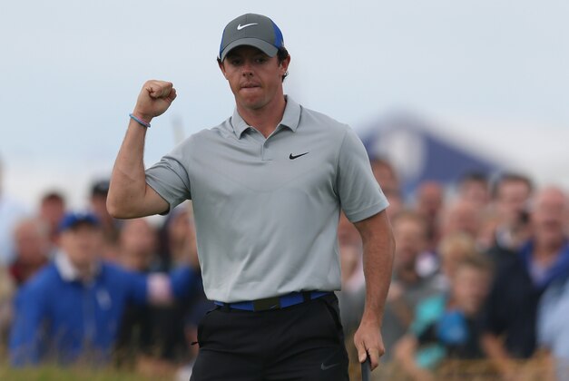 Rory McIlroy of Northern Ireland celebrates after playing an eagle on the 16th hole during the third day of the British Open Golf championship at the Royal Liverpool golf club, Hoylake, England, Saturday July 19, 2014. (AP Photo/Jon Super)