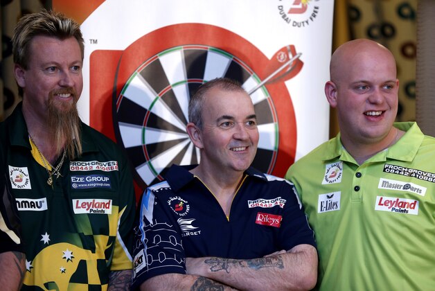 DUBAI, UNITED ARAB EMIRATES - MAY 28: (L-R) Simon Whitlock, Phil Taylor and Michael Van Gerwen are pictured during the draw ceremony for the Dubai Duty Free Darts Masters to reveal the Quarter Final matches at Dubai Duty Free Tennis Stadium, Irish Village, on May 28, 2014 in Dubai, United Arab Emirates. (Photo by Francois Nel/Getty Images) DUBAI, UNITED ARAB EMIRATES - MAY 28: (L-R) Simon Whitlock, Phil Taylor and Michael Van Gerwen are pictured during the draw ceremony for the Dubai Duty Free Darts Masters to reveal the Quarter Final matches at Dubai Duty Free Tennis Stadium, Irish Village, on May 28, 2014 in Dubai, United Arab Emirates. (Photo by Francois Nel/Getty Images)