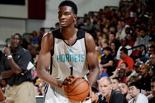LAS VEGAS, NV - JULY 13: Noah Vonleh #1 of the Charlotte Hornets handles the ball against the Sacramento Kings at the Samsung NBA Summer League 2014 on July 13, 2014 at the Cox Pavilion in Las Vegas, Nevada. NOTE TO USER: User expressly acknowledges and agrees that, by downloading and or using this photograph, User is consenting to the terms and conditions of the Getty Images License Agreement. Mandatory Copyright Notice: Copyright 2014 NBAE (Photo by Garrett Ellwood/NBAE via Getty Images)