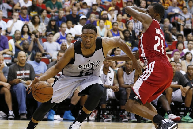 Milwaukee Bucks' Jabari Parker drives by Cleveland Cavaliers' Andrew Wiggins during an NBA summer league basketball game Friday, July 11, 2014, in Las Vegas. (AP Photo/John Locher) Milwaukee Bucks' Jabari Parker drives by Cleveland Cavaliers' Andrew Wiggins during an NBA summer league basketball game Friday, July 11, 2014, in Las Vegas. (AP Photo/John Locher)