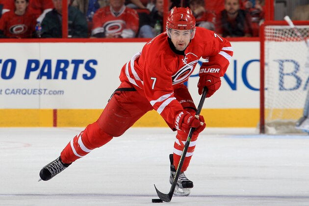 RALEIGH, NC - MARCH 11: Ryan Murphy #7 of the Carolina Hurricanes carries the puck during their NHL game against the New York Rangers at PNC Arena on March 11, 2014 in Raleigh, North Carolina.  (Photo by Gregg Forwerck/NHLI via Getty Images)
