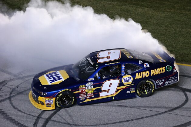 JOLIET, IL - JULY 19:  Chase Elliott, driver of the #9 Napa Auto Parts Chevrolet, wins the EnjoyIllinois.com 300 race at Chicagoland Speedway on July 19, 2014 in Joliet, Illinois.  (Photo by Jonathan Daniel/Getty Images)