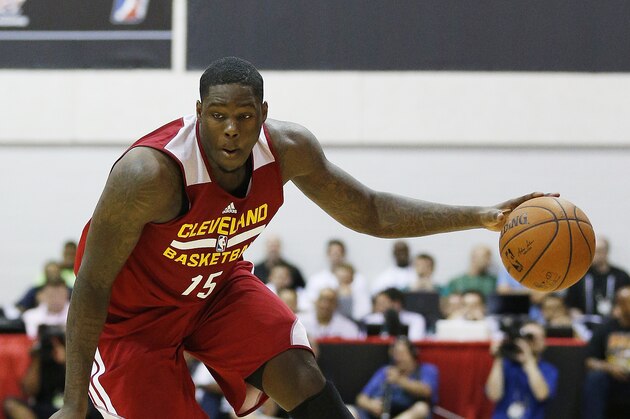 The Cleveland Cavaliers' Anthony Bennett drives toward the basket against the Milwaukee Bucks in an NBA summer league basketball game Friday, July 11, 2014, in Las Vegas. (AP Photo/John Locher)