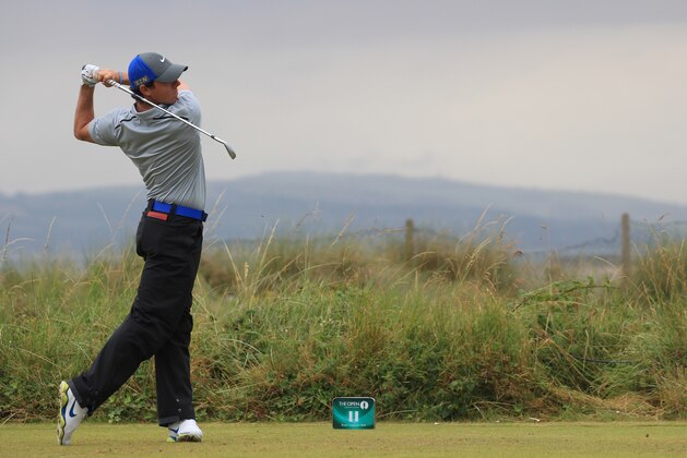 Rory McIlroy of Northern Ireland plays a shot off the 11th tee during the third day of the British Open Golf championship at the Royal Liverpool golf club, Hoylake, England, Saturday July 19, 2014. (AP Photo/Jon Super)