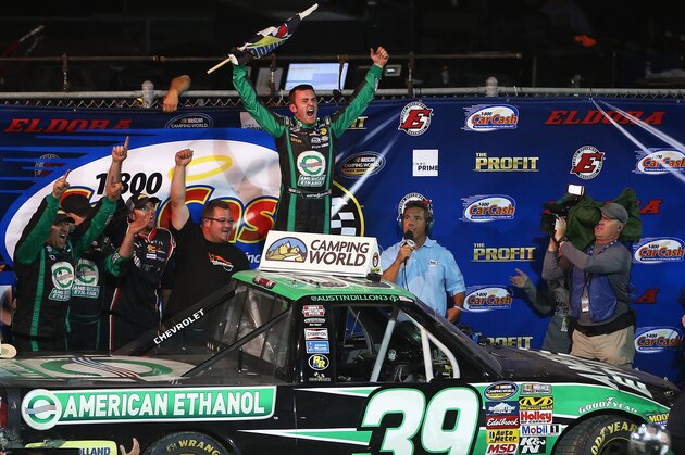 ROSSBURG, OH - JULY 24:  Austin Dillon, driver of the #39 American Ethanol Chevrolet, celebrates in victory lane after winning the NASCAR Camping World Truck Series inaugural Mudsummer Classic at Eldora Speedway on July 24, 2013 in Rossburg, Ohio.  (Photo by Tom Pennington/Getty Images)