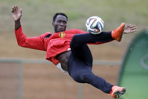 Romelu Lukaku kicks the ball during a training session of Belgium in Mogi Das Cruzes, Brazil, Thursday, June 19, 2014. Belgium play in group H of the 2014 soccer World Cup. (AP Photo/Andrew Medichini)