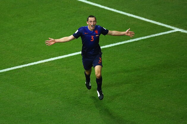 SALVADOR, BRAZIL - JUNE 13: Stefan de Vrij of the Netherlands celebrates scoring his teams third goal during the 2014 FIFA World Cup Brazil Group B match between Spain and Netherlands at Arena Fonte Nova on June 13, 2014 in Salvador, Brazil.  (Photo by Jeff Gross/Getty Images)