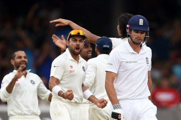LONDON, ENGLAND - JULY 20:  England batsman Alastair Cook leaves the crease after being dismissed as the India fielders celebrate during day four of 2nd Investec Test match between England and India at Lord's Cricket Ground on July 20, 2014 in London, United Kingdom.  (Photo by Stu Forster/Getty Images)