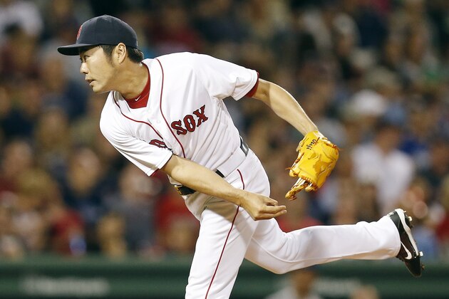 Boston Red Sox's Koji Uehara pitches during the ninth inning of a baseball game iagainst the Kansas City Royals n Boston, Saturday, July 19, 2014. The Red Sox won 2-1. (AP Photo/Michael Dwyer)
