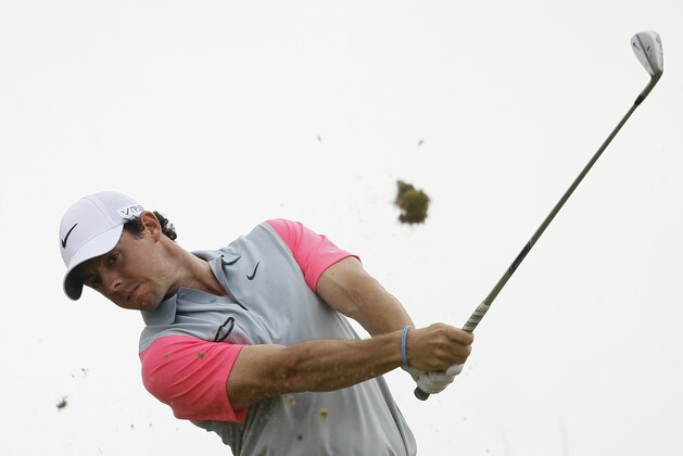 Rory McIlroy of Northern Ireland plays a shot off the 14th tee during the final round of the British Open Golf championship at the Royal Liverpool golf club, Hoylake, England, Sunday July 20, 2014. (AP Photo/Peter Morrison) Rory McIlroy of Northern Ireland plays a shot off the 14th tee during the final round of the British Open Golf championship at the Royal Liverpool golf club, Hoylake, England, Sunday July 20, 2014. (AP Photo/Peter Morrison)