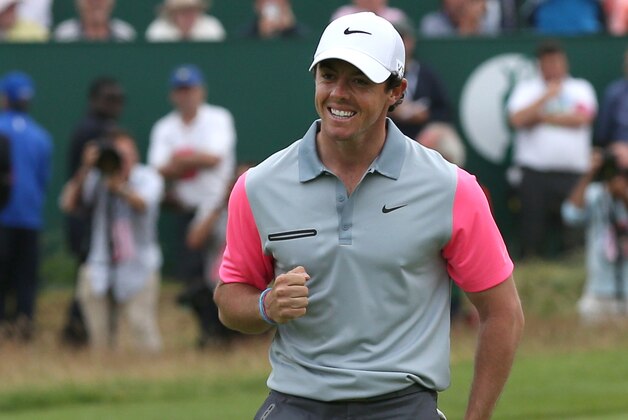 Rory McIlroy of Northern Ireland celebrates winning the British Open Golf championship  after the final round at the Royal Liverpool golf club, Hoylake, England, Sunday July 20, 2014. (AP Photo/Scott Heppell)