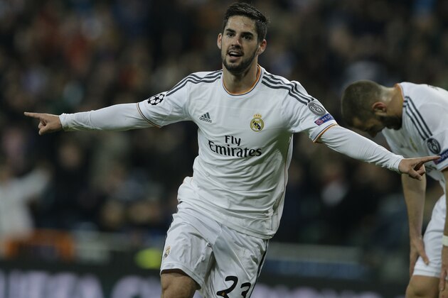 Real's Isco celebrates scoring his side's first goal during a Champions League quarterfinal first leg soccer match between Real Madrid and Borussia Dortmund at the Santiago Bernabeu stadium in Madrid, Spain, Wednesday April 2, 2014. (AP Photo/Paul White)