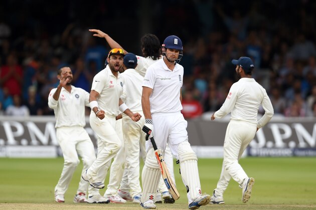 LONDON, ENGLAND - JULY 20:  England batsman Alastair Cook leaves the crease after being dismissed as the India fielders celebrate during day four of 2nd Investec Test match between England and India at Lord's Cricket Ground on July 20, 2014 in London, United Kingdom.  (Photo by Stu Forster/Getty Images)