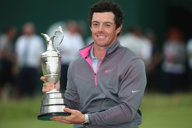HOYLAKE, ENGLAND - JULY 20:  Rory McIlroy of Northern Ireland holds the Claret Jug after his two-stroke victory at The 143rd Open Championship at Royal Liverpool on July 20, 2014 in Hoylake, England.  (Photo by Andrew Redington/Getty Images)