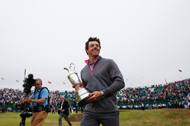 HOYLAKE, ENGLAND - JULY 20: Rory McIlroy of Northern Ireland holds the Claret Jug after his two-stroke victory at The 143rd Open Championship at Royal Liverpool on July 20, 2014 in Hoylake, England. (Photo by Tom Pennington/Getty Images) HOYLAKE, ENGLAND - JULY 20: Rory McIlroy of Northern Ireland holds the Claret Jug after his two-stroke victory at The 143rd Open Championship at Royal Liverpool on July 20, 2014 in Hoylake, England. (Photo by Tom Pennington/Getty Images)
