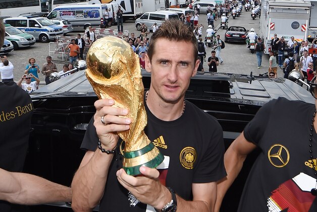 BERLIN, GERMANY - JULY 15: Miroslav Klose celebrates during the German team victory ceremony on July 15, 2014 in Berlin, Germany. Germany won the 2014 FIFA World Cup Brazil match against Argentina in Rio de Janeiro on July 13.  (Photo by Markus Gilliar - Pool /Getty Images)