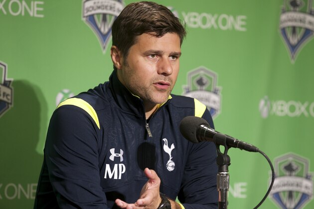 Tottenham Hotspur manager Mauricio Pochettino address the media after a friendly soccer match against the Seattle Sounders in Seattle, Saturday, July 19, 2014. The matched ended in a 3-3 draw. (AP Photo/Stephen Brashear)