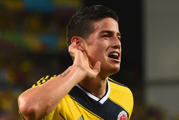 CUIABA, BRAZIL - JUNE 24:  James Rodriguez of Colombia celebrates scoring his team's fourth goal during the 2014 FIFA World Cup Brazil Group C match between Japan and Colombia at Arena Pantanal on June 24, 2014 in Cuiaba, Brazil.  (Photo by Christopher Lee/Getty Images)