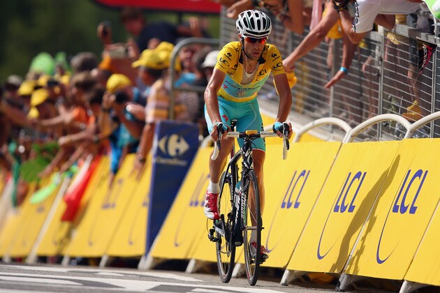RISOUL, FRANCE - JULY 19:  Vincenzo Nibali of Italy and the Astana ProTeam retained his race leader's yellow jersey after the fourteenth stage of the 2014 Tour de France, a 177km stage between Grenoble and Risoul, on July 19, 2014 in Risoul, France.  (Photo by Bryn Lennon/Getty Images)