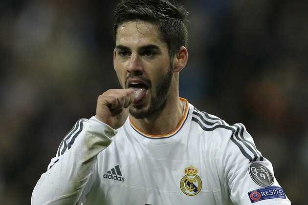 Real's Isco celebrates scoring his side's first goal during a Champions League quarterfinal first leg soccer match between Real Madrid and Borussia Dortmund at the Santiago Bernabeu stadium in Madrid, Spain, Wednesday April 2, 2014. (AP Photo/Paul White)