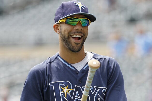 Tampa Bay Rays pitcher David Price laughs with a teammate after taking batting practice before a baseball game against the Minnesota Twins in Minneapolis, Sunday, July 20, 2014. (AP Photo/Ann Heisenfelt) Tampa Bay Rays pitcher David Price laughs with a teammate after taking batting practice before a baseball game against the Minnesota Twins in Minneapolis, Sunday, July 20, 2014. (AP Photo/Ann Heisenfelt)