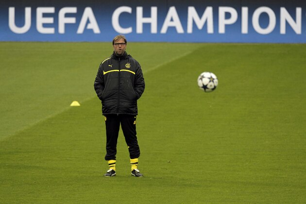 Borussia Dortmund's coach Jurgen Klopp looks at a ball during a training session in Madrid, Monday, April 29, 2013. Borussia Dortmund will play a Champions League semifinal second leg soccer match against Real Madrid on Tuesday. (AP Photo/Andres Kudacki)