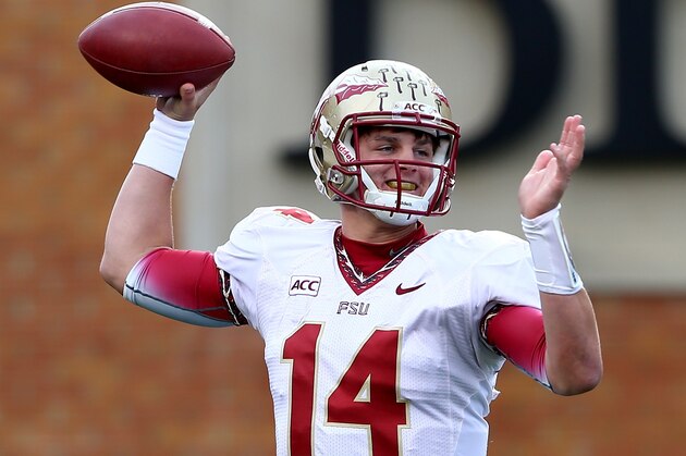 WINSTON SALEM, NC - NOVEMBER 09:  Jacob Coker #14 of the Florida State Seminoles drops back to pass against the Wake Forest Demon Deacons during their game at BB&T Field on November 9, 2013 in Winston Salem, North Carolina.  (Photo by Streeter Lecka/Getty Images)