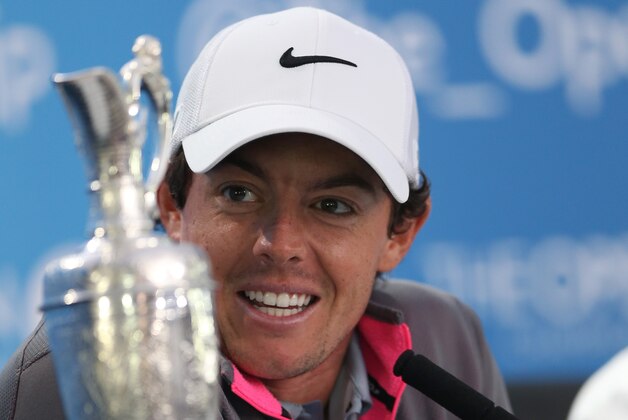 Rory McIlroy of Northern Ireland attends a press conference after winning the British Open Golf championship at the Royal Liverpool golf club, Hoylake, England, Sunday July 20, 2014. (AP Photo/Jon Super)