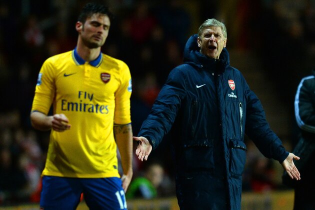 SOUTHAMPTON, ENGLAND - JANUARY 28:  Arsene Wenger manager of Arsenal reacts s he looks to Olivier Giroud of Arsenal during the Barclays Premier League match between Southampton and Arsenal at St Mary's Stadium on January 28, 2014 in Southampton, England.  (Photo by Mike Hewitt/Getty Images)