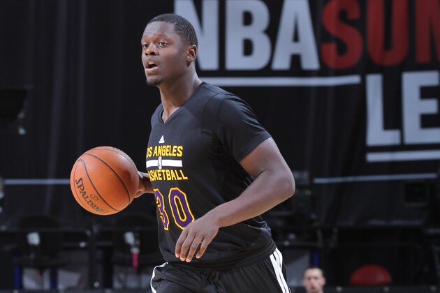 LAS VEGAS, NV - JULY 16: Julius Randle #30 of the Los Angeles Lakers handles the ball against the Philadelphia 76ers on July 16, 2014 at the Thomas & Mack Center in Las Vegas, Nevada. NOTE TO USER: User expressly acknowledges and agrees that, by downloading and or using this photograph, User is consenting to the terms and conditions of the Getty Images License Agreement. Mandatory Copyright Notice: Copyright 2014 NBAE (Photo by Jack Arent/NBAE via Getty Images)