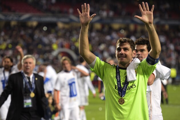 Real goalkeeper Iker Casillas gestures, at the end of the Champions League final soccer match between Atletico Madrid and Real Madrid in Lisbon, Portugal, Saturday, May 24, 2014. Real Madrid won 4-1. (AP Photo/Manu Fernandez) Real goalkeeper Iker Casillas gestures, at the end of the Champions League final soccer match between Atletico Madrid and Real Madrid in Lisbon, Portugal, Saturday, May 24, 2014. Real Madrid won 4-1. (AP Photo/Manu Fernandez)