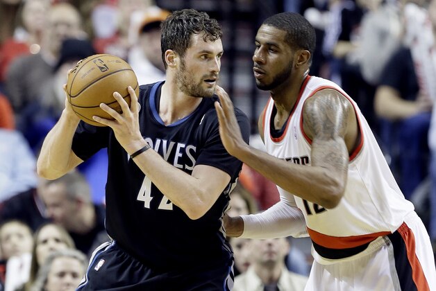 Portland Trail Blazers forward LaMarcus Aldridge, right, plays tight defense on Minnesota Timberwolves forward Kevin Love during the second half of an NBA basketball game in Portland, Ore., Saturday, Jan. 25, 2014. Aldridge held Love to 15 points while he topped the Trail Blazers scoring with 21 points as they beat Minnesota 115-104. (AP Photo/Don Ryan) Portland Trail Blazers forward LaMarcus Aldridge, right, plays tight defense on Minnesota Timberwolves forward Kevin Love during the second half of an NBA basketball game in Portland, Ore., Saturday, Jan. 25, 2014. Aldridge held Love to 15 points while he topped the Trail Blazers scoring with 21 points as they beat Minnesota 115-104. (AP Photo/Don Ryan)