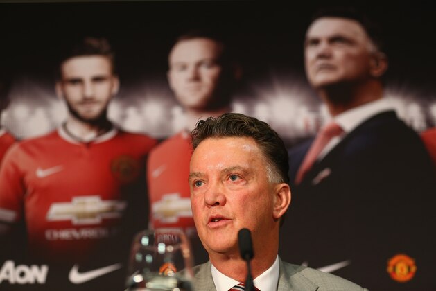 MANCHESTER, ENGLAND - JULY 17:  Louis van Gaal appears at a press conference as he is unveiled as the new Manchester United manager at Old Trafford on July 17, 2014 in Manchester, England.  (Photo by Clive Mason/Getty Images)