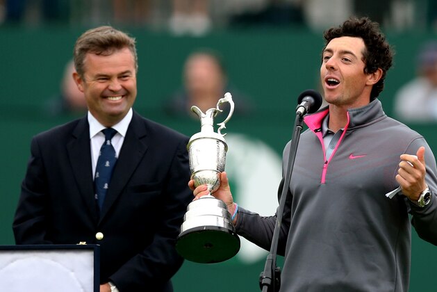 Rory McIlroy of Northern Ireland speaks while holding the Claret Jug trophy after winning the British Open Golf championship at the Royal Liverpool golf club, Hoylake, England, Sunday July 20, 2014. (AP Photo/Scott Heppell)